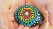 A stroke of zen: Painting mandala stones for relaxation and fun photo