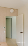 Hallway painted in Resene Quarter Lemon Grass and Resene Double Pearl Lusta