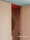 Bathroom and living area painted in Resene Juniper and Resene Red Oxide