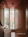 Bathroom with ceiling painted in Resene Red Oxide