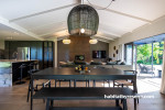 Living area, open plan dining area featuring wooden floors