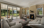 Living room painted in Resene Triple Parchment and Resene Half Spanish White