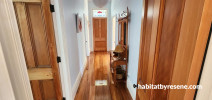 Hallway, hallway featuring neutral walls and wooden floors