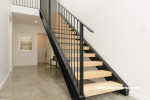 resene alabaster, white walls, scandi design, white entrance, entranceway, hallway, steel staircase