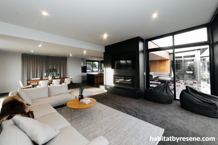 lounge, black and white lounge, grey lounge, black feature wall, open plan living, resene nero