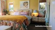 master bedroom, gold bedroom, yellow bedroom, gold feature wall, ochre bedroom