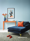 blue living room, blue lounge, blue feature wall, blue room, blue interior, blue and orange