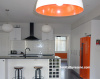 orange, white, white kitchen, tiled kitchen, tiled splashback, painted fridge