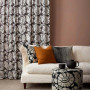 lounge, living room, brown lounge, brown living room, patterned curtains, dusky red walls
